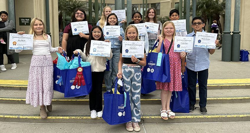 Winning artists display their entries in the 2024 Escondido Student Poster Contest. Photo: City of Escondido