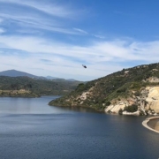 CalFIRE firefighting helicopter flies over Loveland Reservoir. Photo: Sweetwater Authority