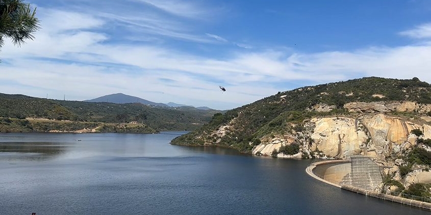 CalFIRE firefighting helicopter flies over Loveland Reservoir. Photo: Sweetwater Authority