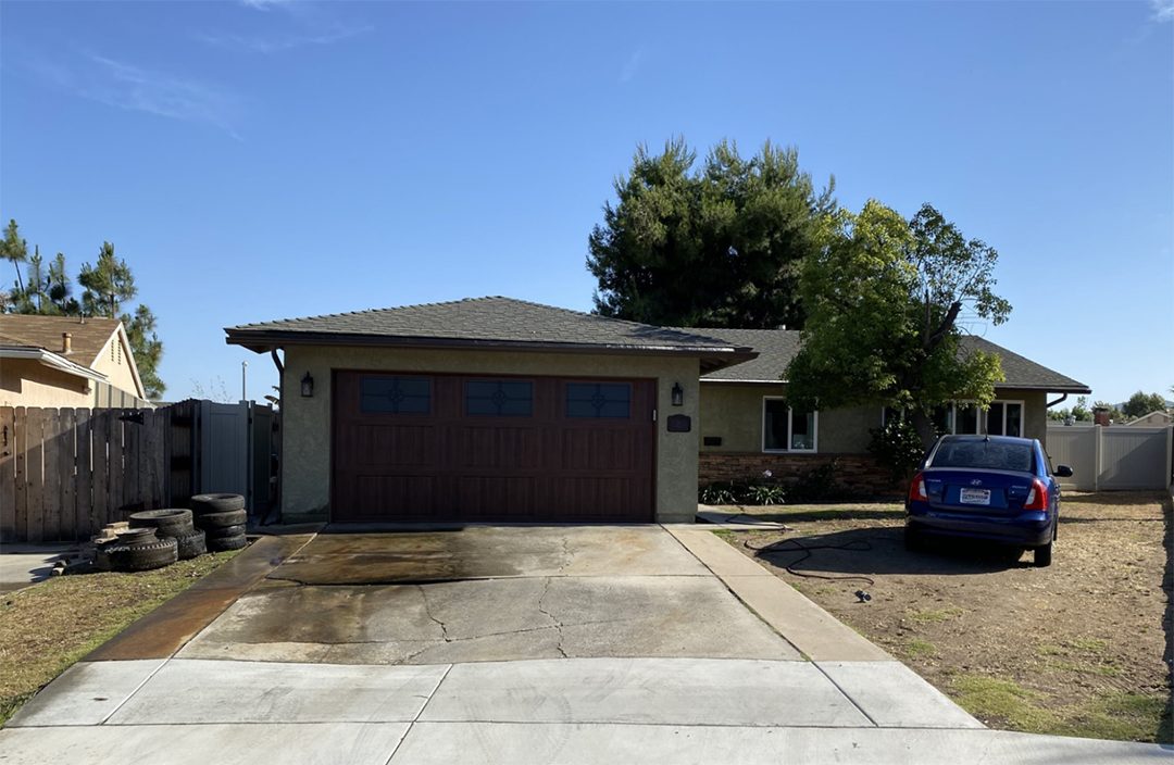 The McAllisters' home before its landscape makeover. Photo: Padre Dam Municipal Water District tropical landscape