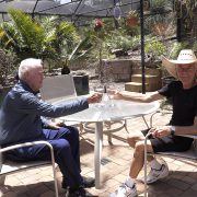 John Allen and Bob Whiting enjoy their beautiful Vista yard, the winner of the 2024 Vallecitos WaterSmart Landscape Design content. Photo: Vallecitos Water DIstrict diverse design
