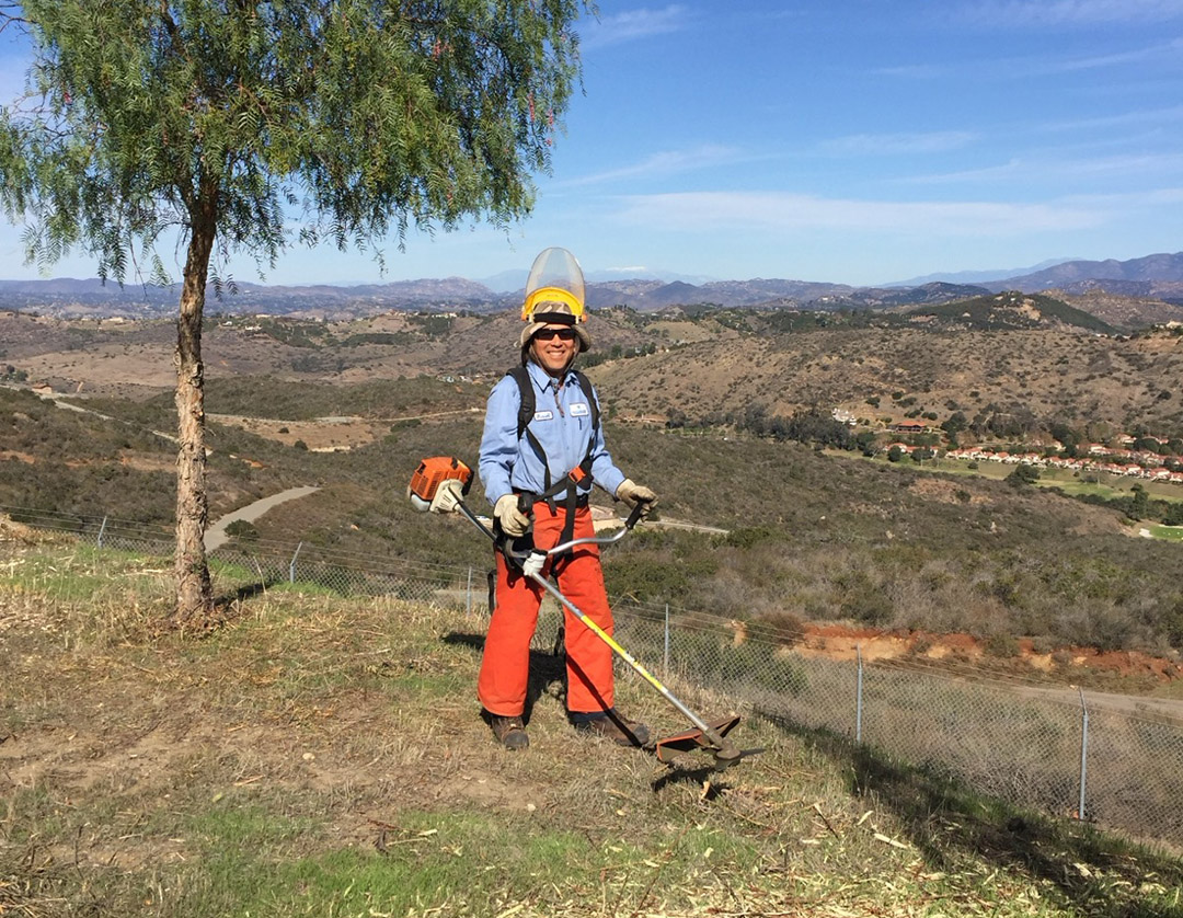 Monitoring and removing invasive plant species is a key responsibility for Russ Kubota. Photo: Vallecitos Water District landscape maintenance