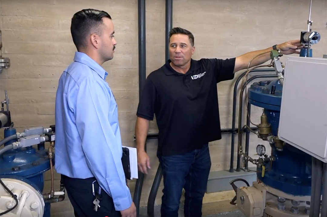 Dean Farris and Marselino Sanchez discuss daily operations. Photo: Vista Irrigation District/Video Capture
