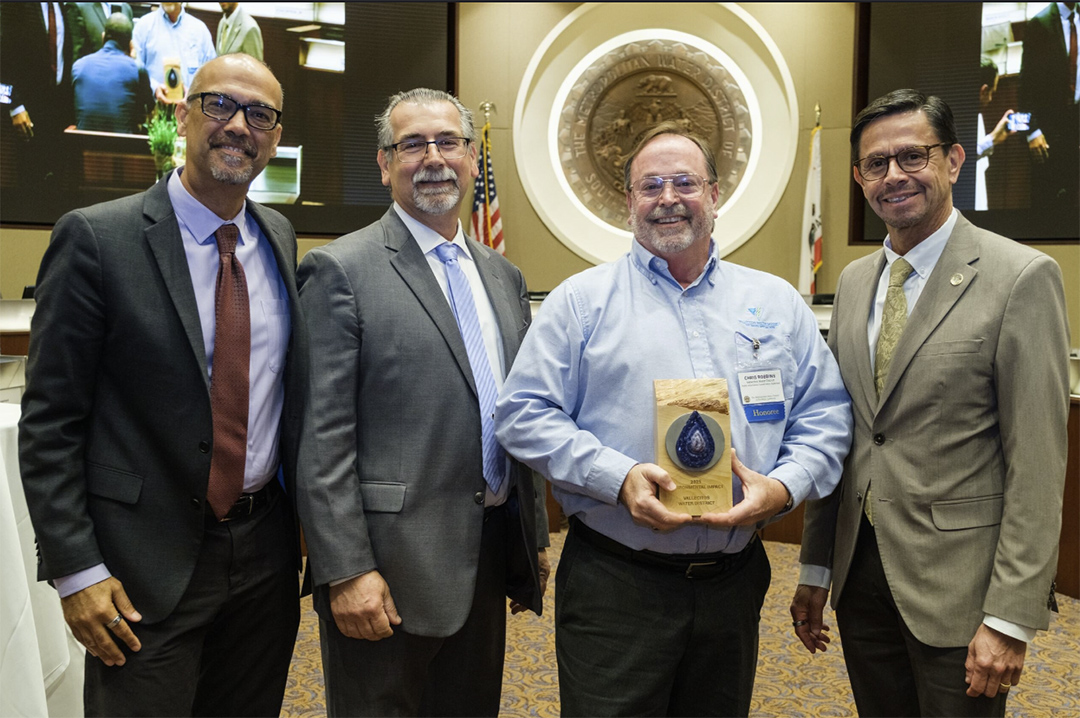 L to R: Metropolitan General Manager Deven Upadhyay, Metropolitan Senior Water Specialist Gary Tilkian, Vallecitos Public Information/Conservation Supervisor Chris Robbins, and Metropolitan Board Chairman Adan Ortega at the One Water Awards. Photo: Metropolitan Water District One Water Awards