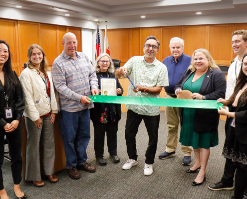 (L to R) Staff from the City of La Mesa and the U.S. Green Building Council of California (USGBC) present the Green Business Certification to Helix Water District's board of directors. From left: City of La Mesa's Hilary Ego and Lainey Bloom, USGBC's Robert Carr, Division 2 Director Andrea Beth Damsky, Division 3 Director Mark Gracyk, Board President Dan McMillan, Division 4 Director Kathleen Coates Hedberg, and City of La Mesa's Logan Kelly and Serena Lee. Photo: Helix Water District