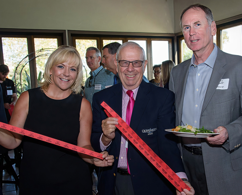 (L to R) General Manager Kimberly A. Thorner and former OMWD board members Bob Topolovac and Larry Watt at a 2017 Water for People fundraising event. Photo: Olivenhain Municipal Water District