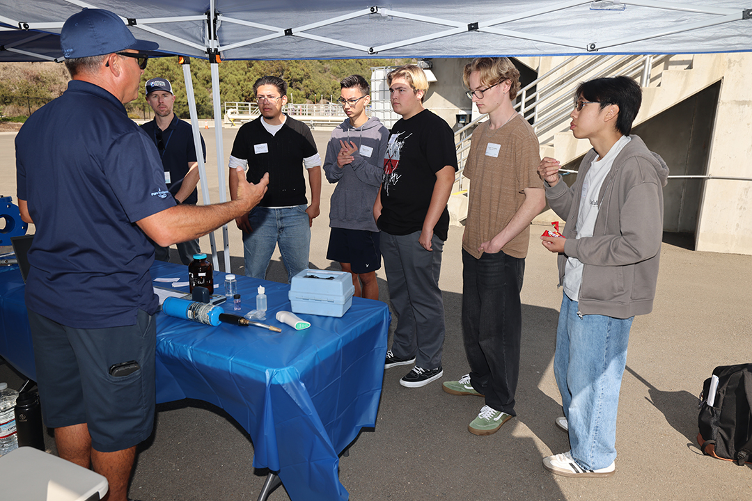 Adam Calm, Systems Operator for the Olivenhain Municipal Water District, speaks with students at Water Career Day 2025. Photo: Olivenhain Municipal Water District