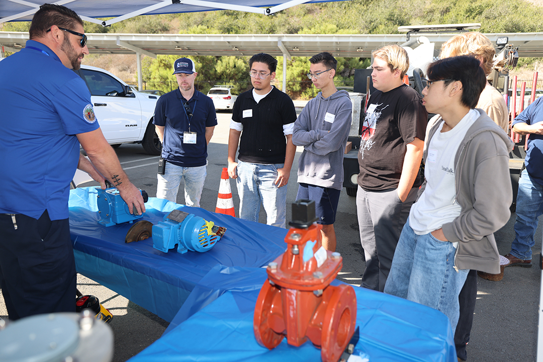 Justin Fichtelman, Valve Maintenance Technician for the Olivenhain Municipal Water District, offers one of the hands-on opportunities for students at Water Career Day 2024. Photo: Olivenhain Municipal Water District