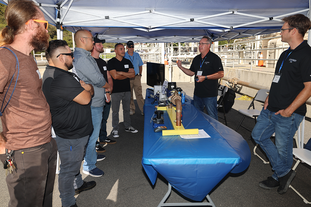 Brandon Barnick, Field Services Supervisor, and Morgan Ferguson, Field Services Technician encourage students to consider careers in the water and wastewater industry. Photo: Olivenhain Municipal Water District
