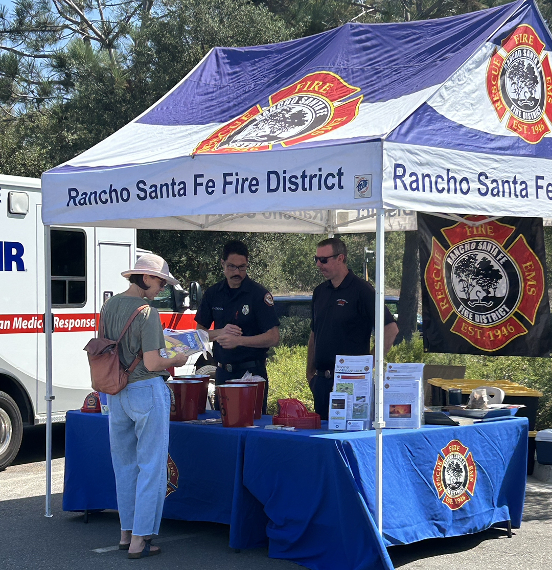 Teresa Chase10:54 AM (3 minutes ago) to me 😊 Representatives of the Rancho Santa Fe Fire Protection District speak with community members about fire safety at OMWD’s emergency preparedness open house in September.