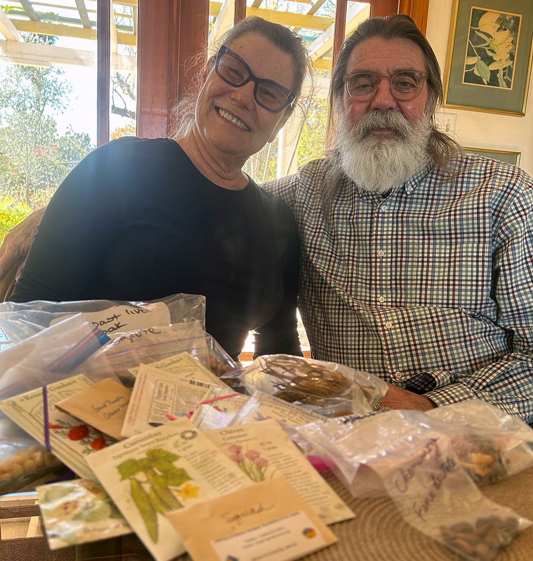 Donn and Terry Reese with examples of the seeds they have contributed to the Vallecitos Water District Seed Library. Photo: Vallecitos Water District