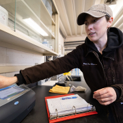California Department of Water Resources Hydroelectric Plant Operator Apprentice Katie Swadener demonstrates how to monitor for water quality. Photo: Andrew Nixon / California Department of Water Resources