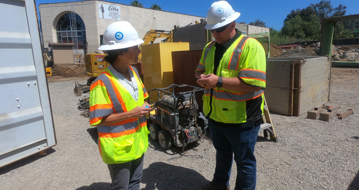 Vallecitos Water District Asset Management Supervisor and Alison Fisher, Capital Facility Assistant Engineer. confer at the Montiel Lift Station project. Photo: Vallecitos Water District water industry careers