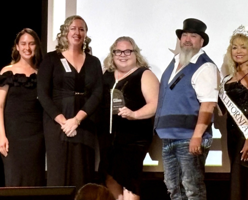 (L to R): Yailey Gonzalez and Laurne Magnuson of the Water Conservation Garden, joined by Helix Water District Board President Kathleen Coates-Hedberg and Vice President Joel Scalzitti. Photo: Helix Water District