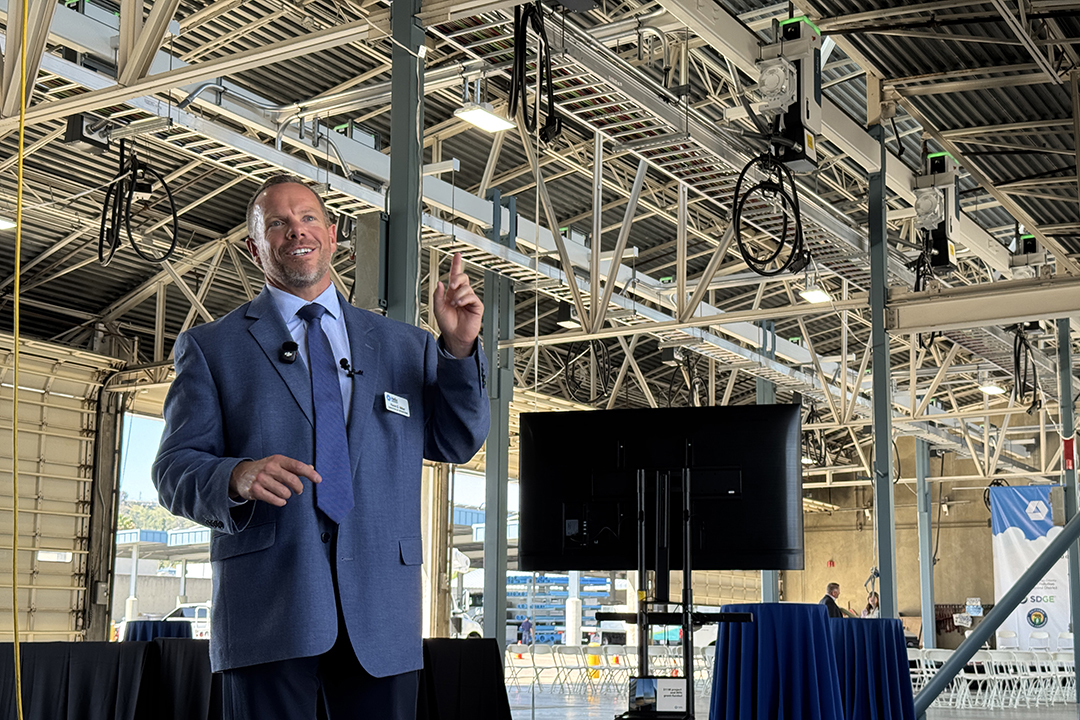 Helix Water District Kevin Miller highlights the new overhead EV charging infrastructure at the Nat L. Eggert Operations Center. Photo: San Diego County Water Authority