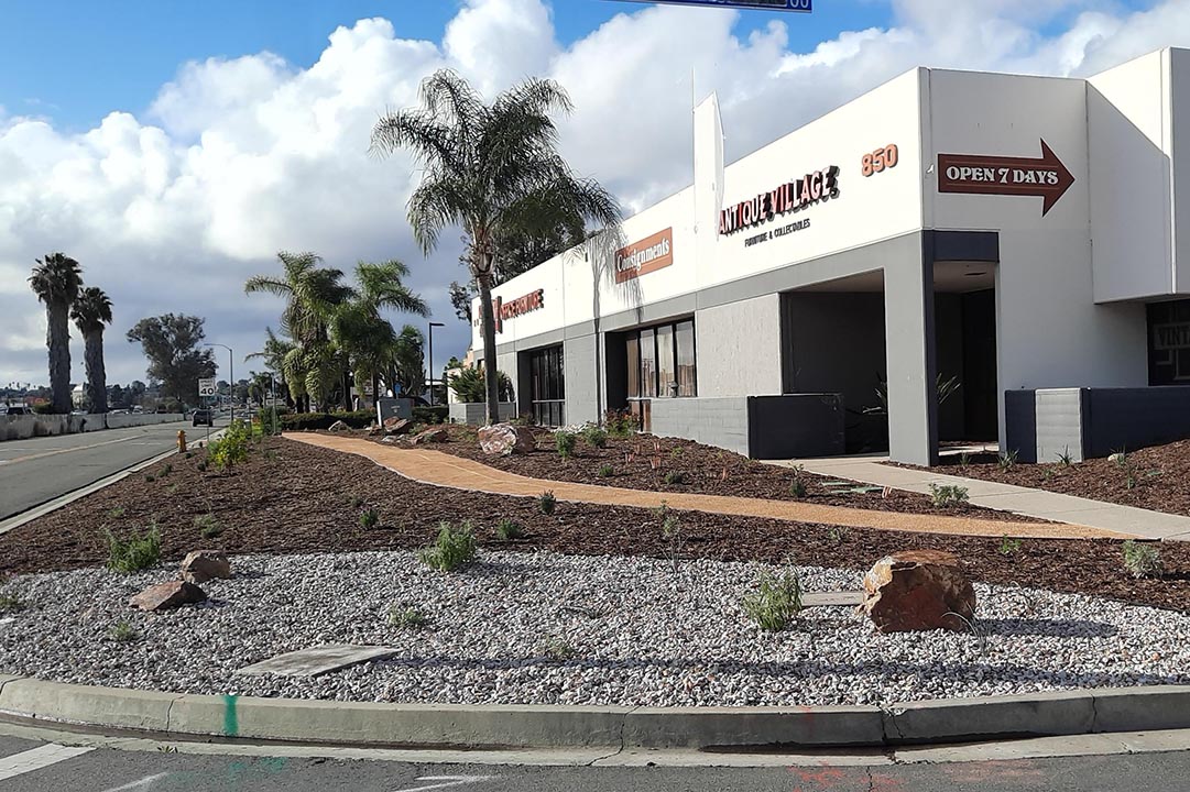 The new landscaping features plants with colorful blooms and a walkway. Photo: Vallecitos Water District