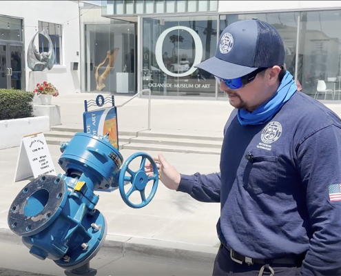 City of Oceanside Mechanical Technologist Erick Adriance demonstrates equipment used to help maintain the city's water and wastewater systems. Photo: San Diego County Water Authority