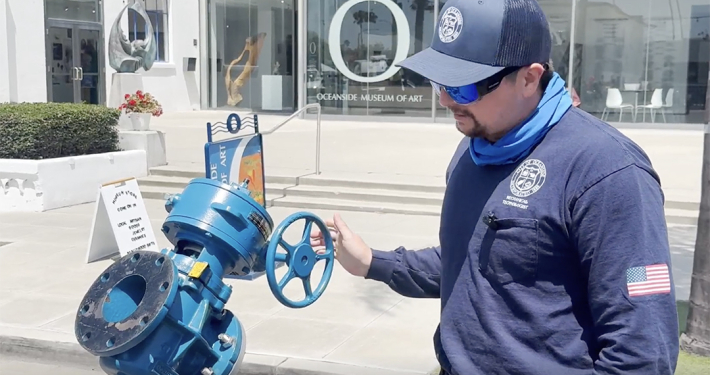 City of Oceanside Mechanical Technologist Erick Adriance demonstrates equipment used to help maintain the city's water and wastewater systems. Photo: San Diego County Water Authority