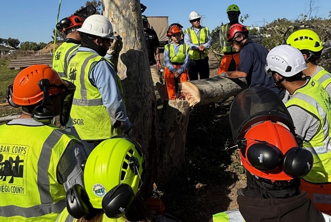 Urban Corps San Diego team members get a briefing before beginning habitat restoration work. Photo: Sweetwater Authority