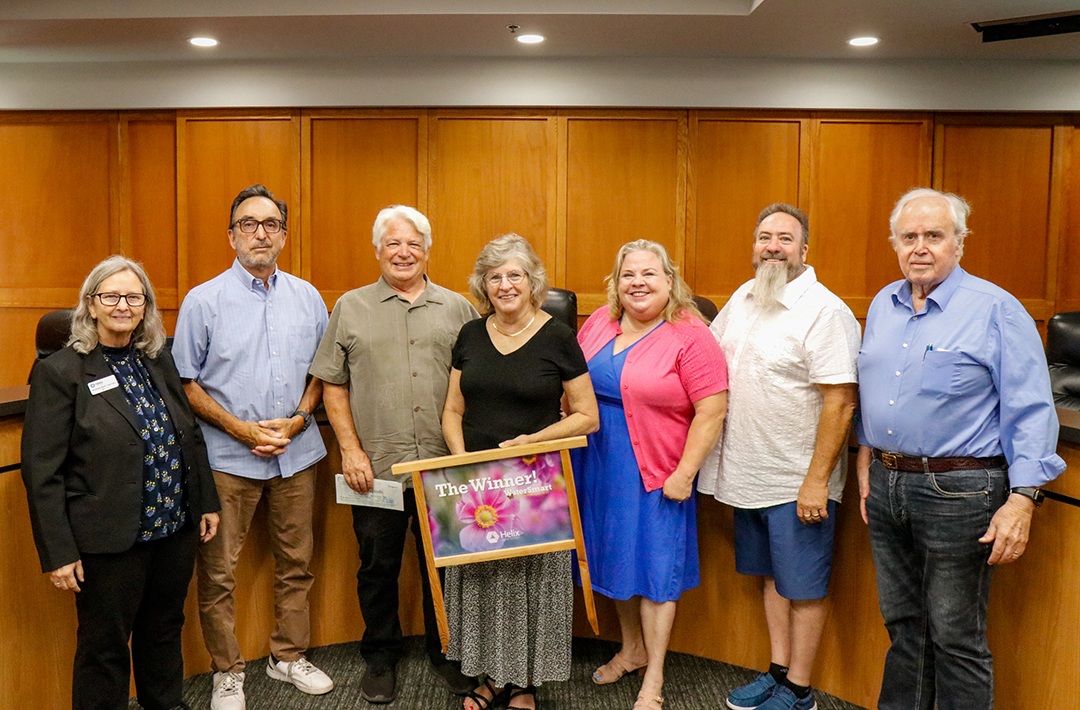 Winning homeowners Mark and Terri L. receive their 2026 Landscape Contest award from Helix Water District board members (L to R): Andrea Beth Damsky, Division 2; Mark Gracyk, Division 3; Kathleen Coates Hedberg, President; Joel A. Scalzitti, Vice President; and Daniel H. McMillan, Division 1. Photo: Helix Water District